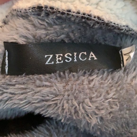 A grey and white fluffy winter jacket - Picture 2 of 2